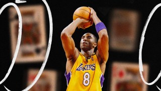 Basketball player in a yellow jersey with number 8, showcasing his leadership mentality, prepares to shoot a jump shot on the court.